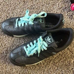 Adidas Black Sneakers with Teal Laces